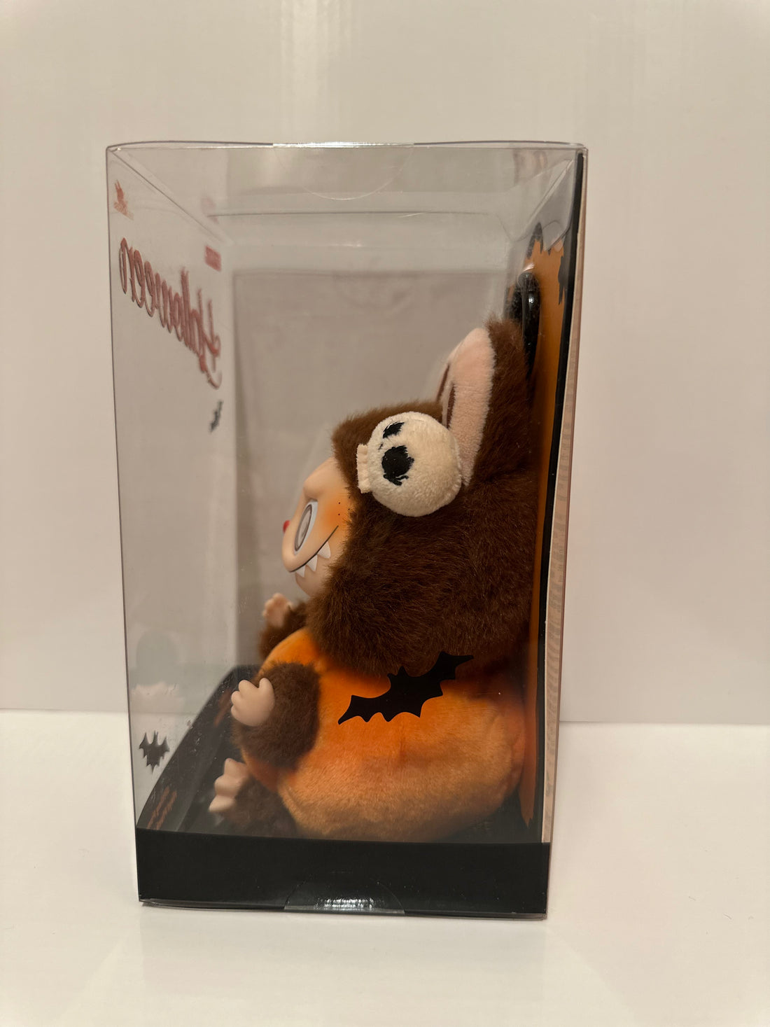 Pop Mart Halloween Labubu – Sitting Pumpkin Vinyl Plush Pendant (Limited Edition)
